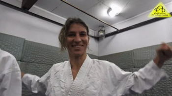 Kiniku vs Xena judo gi match.webp