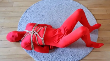 Boxtied self bondage in spandex.webp