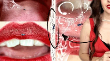 Vintage date of a giantess and a tiny man in a sea of saliva.webp