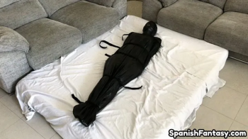 Mummified in a latex sack.webp