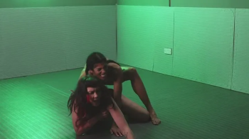Lesbian wrestling and strap on domination.webp