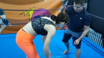 19 yo girl in spandex legging wrestles a guy.webp