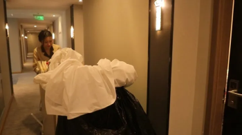 Chinese hotel cleaner's feet were licked and tickled.webp