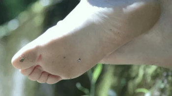 Giantess Reading Outside Unaware.webp