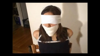 Blindfolded Tied to chair and Gagged in new apartment.webp