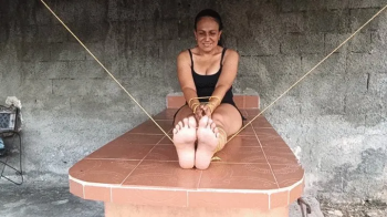 How much tickling this woman receives while she is completely tied up (3).webp