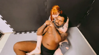 ROUND 1 Mel fire is burning against a black big stud - interracial mixed wrestling fight.webp