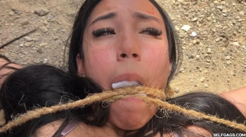 Latina Military Domination- Barby Gagged and Staked! (high res mp4).webp