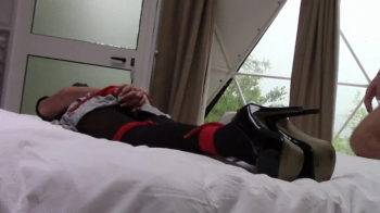 Milf in pantyhose and high heels tied and gagged gets fucked in all holes with many orgasms.webp
