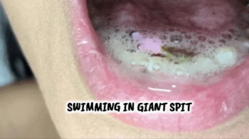 giant makes tiny man swim in his spit.webp