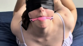 Hogtied and struggling - handcuffed, ankle cuffed, toe cuffed, thumb cuffed, ballgagged and blindfolded.webp