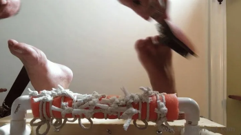 Tickling with Lotion from Below - lotion on big wide feet and tickling view from below.webp