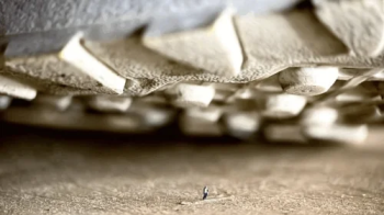 Sneakers and dirty socks of a giantess loom over a tiny guy.webp