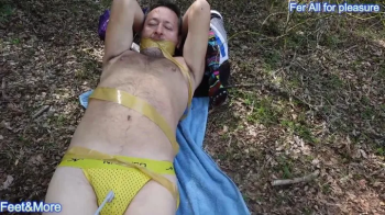 Fer is tied gagged and tickled in the park-only tickle version.webp