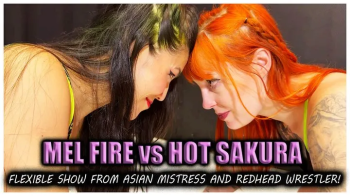 Mel Fire vs Hot Sakura - Sexy flexible redhead asian girl fight - Female wrestling - Scissorholds - Headscissors - Submi.webp