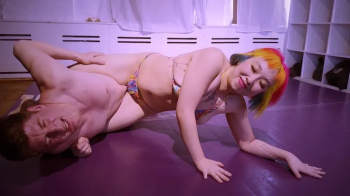 Lux Gray Lovingly Dominates Hanz VanDerKill at Brigit Heart's Live Event in front of a live audience, publicly humiliati.webp