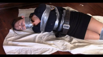 Long Legged Pantyhosed Girl Next Door in Uniform Taped Up and Gagged with Real Duct Tape.webp