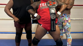 Male Wrestlers Double-Team And Try To Unmask The Famous Redstar.webp