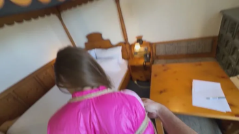 Rachel Adams bound and gagged in shiny nylon Shorts and Windbreaker.webp