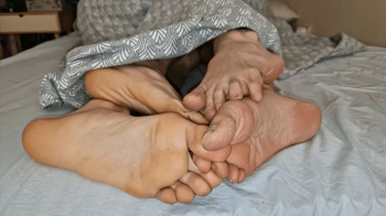 Rubbing and Intertwining Feet.webp