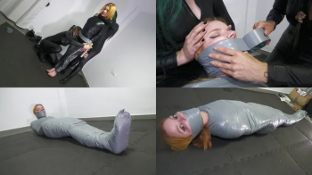Shelvy mummified by the catsuit burglars!.webp