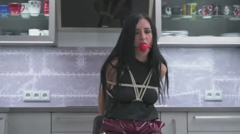 Miss Amira in sexy vinyl pants is bound and gagged (gagging scenes).webp