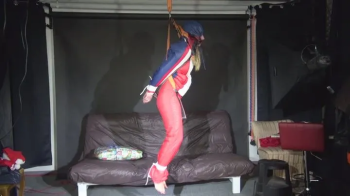 2 Short Clips with Sandra bound and gagged in shiny nylon downwear.webp