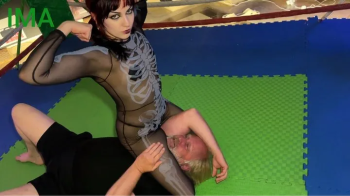The Man in Black vs Goth Delilah - wrestling domination.webp