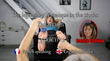 30 min The legendary Veronique of -French Tickling- tickled in the stocks FULL Version ( with English subtitles ).webp