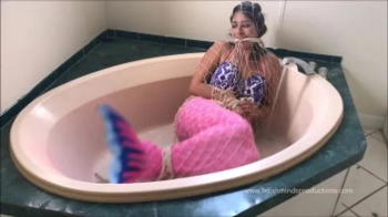 Mermaid caught and taken home.webp