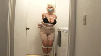 d2506PLUSH-Voluptuous woman tied tight in her full figured panty girdle.webp