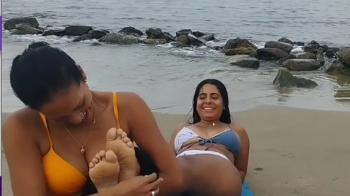 Tickling the soles of a Dani- beach day.webp