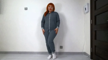 Farting and Gifting in Grey Onesie.webp