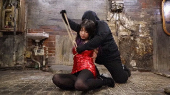 MADE IN JAPAN 19! Ada the mercenary trapped in a zombie infested tunnel, tied and gagged by a mysterious woman!.webp