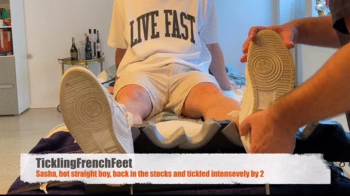 Tickling French Feet - Sacha, hot straight boy, back in the stocks and tickled intensively by 2 (FHD.webp