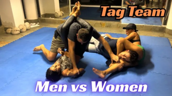 Kink Sports - Men vs Women Tag Team- Pauline and Valerie squeeze the air out of Kevin and David.webp