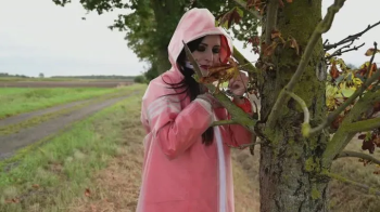 Real Rainwearbondage - Miss Amira bound and gagged in AGU Adidas rain suit and transparent rain gear.webp