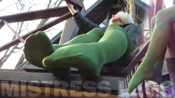 Mistress Legs - Goddess in green pantyhose teases with her feet on the porch (MP4 HD).webp