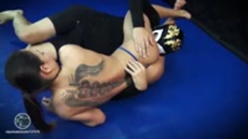 Wrestling Fetish Fantasy - BWS- Nomi Melone vs Black Grappler - The Rematch (topless) - Full Movie,.webp