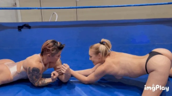 Protein Wrestling - Part 1 KO Vs Jolene Hexx in a topless arm wrestling match.webp