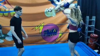 The Wrestling Amazons - Strong skilled blonde wrestles.webp