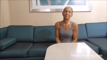 Strong Girls Of Videoteasing - Randi distracts with her Biceps then beats Wimpy in Arm Wrestling.webp