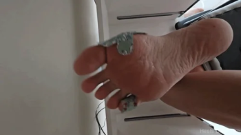Heels Daze Org - Unaware Giantess Working on Laptop Barefoot Pt 8 Band-Aids.webp