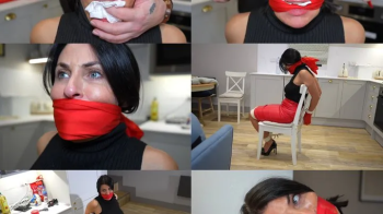 Sarah wild, agent red captured, chair tied and multi gagged with scarves and tape (wmv).webp